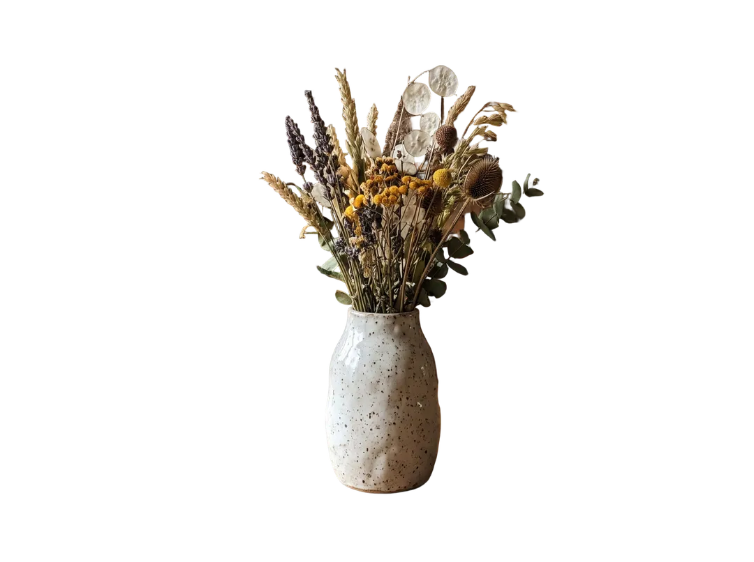 Speckled ceramic vase with dried flowers, background removed (transparent PNG)