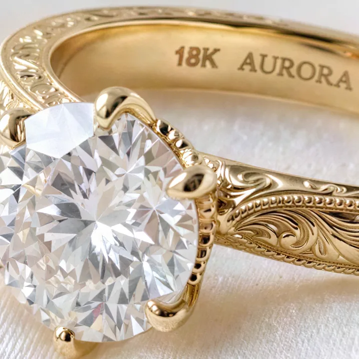 Gold diamond ring with hand engraving on white silk, upscaled 4× with AI, 100% crop