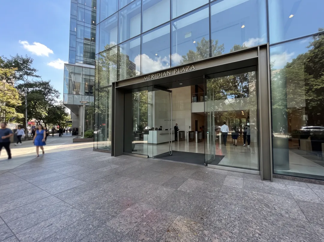 Glass office building entrance, after removing the traffic cones and sign